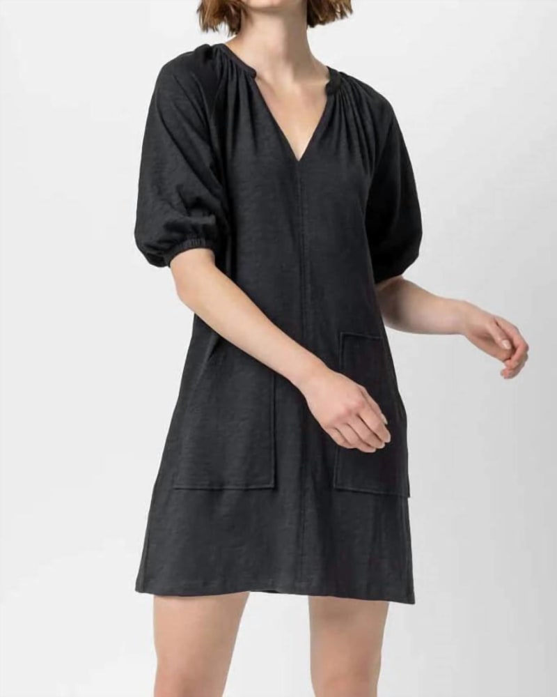 Front of a model wearing a size XL 3/4 Sleeve Split Neck Puff Sleeve Dress in Black in Black by Lilla P. | dia_product_style_image_id:346535